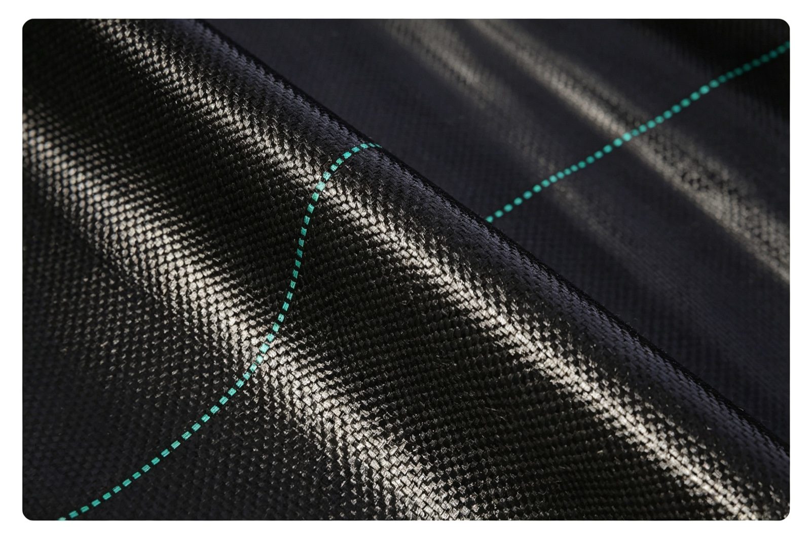 Close-up texture of PE woven weed barrier fabric